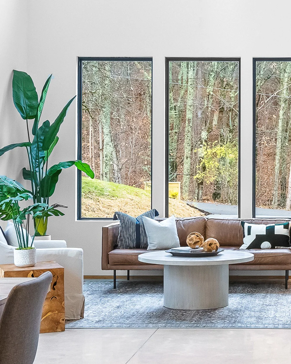 Light-filled living room with Marvin Essential direct glaze windows